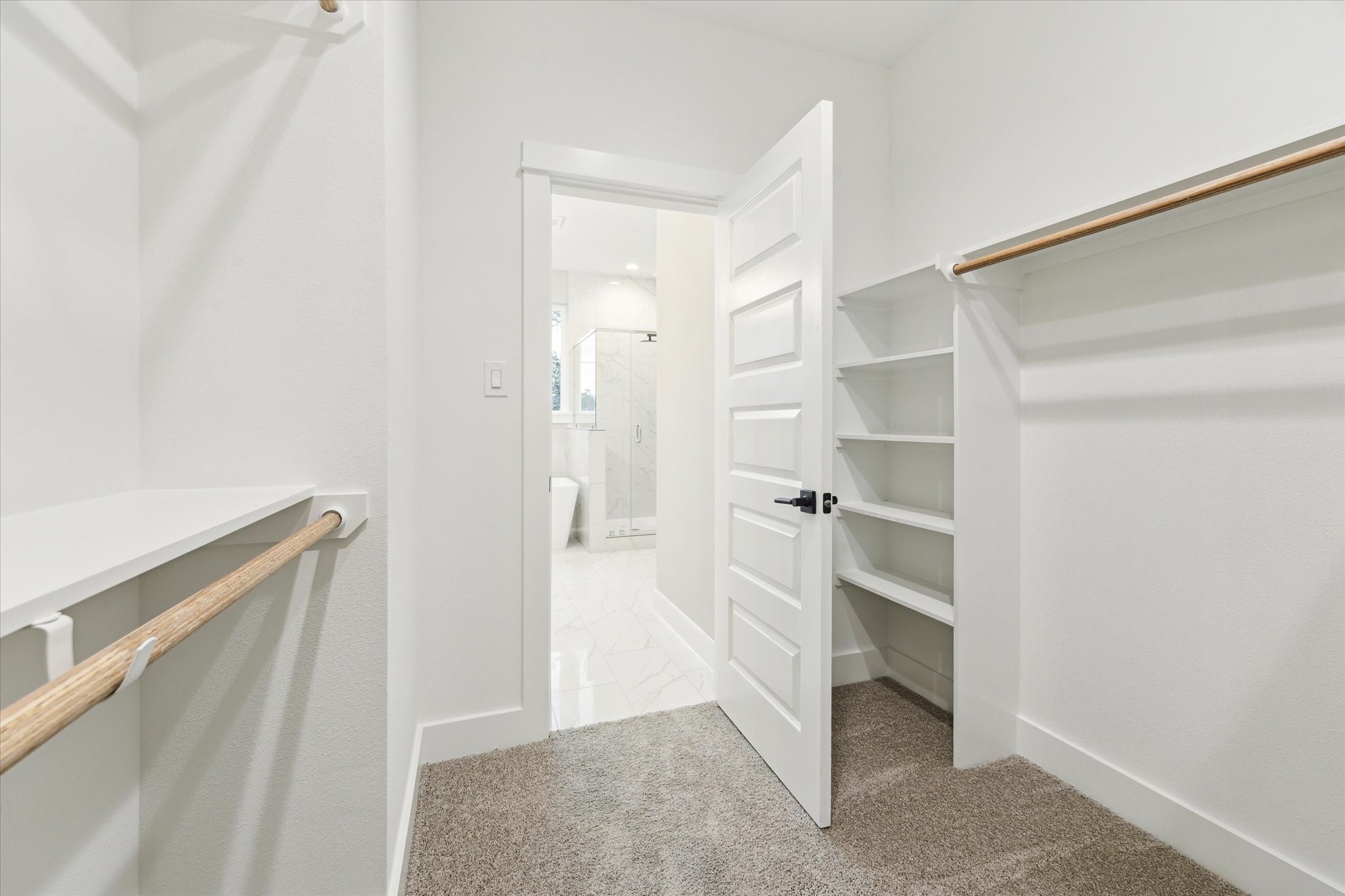 812 Thornton Road, Unit B Houston, TX 77018 - Photo 35 of 39 a view of walk in closet with empty racks