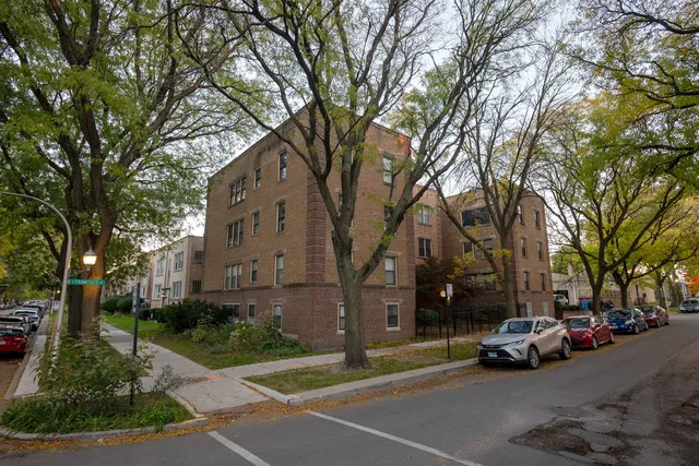 a view of street with parked cars