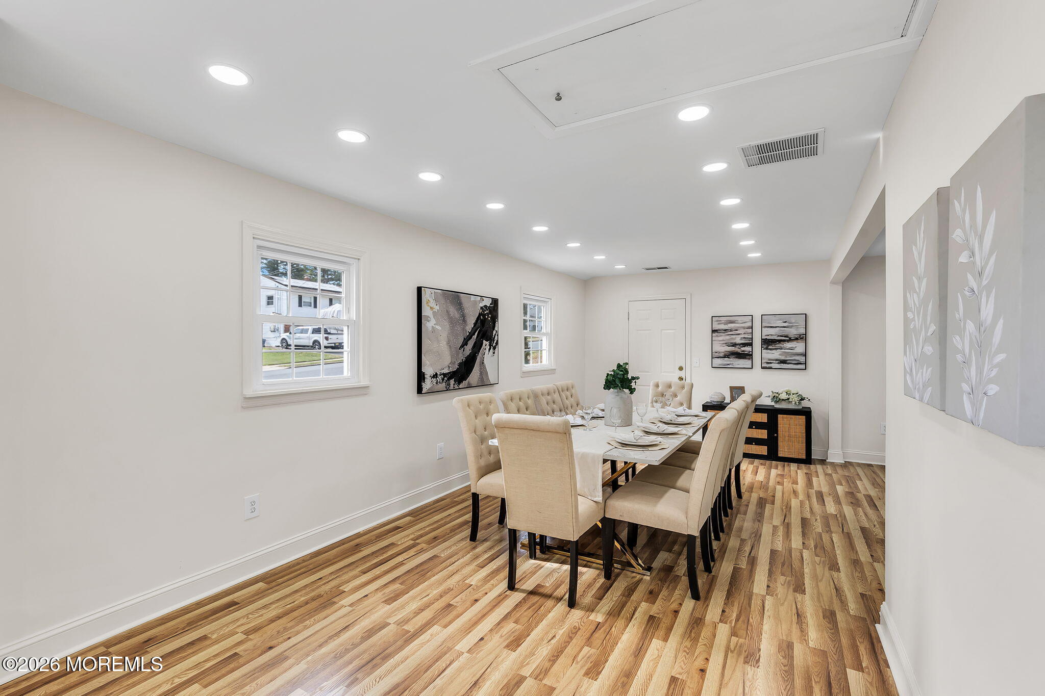 50 Westbrook Road Howell, NJ 07731 - Photo 11 of 73 a view of a dining room with furniture window and wooden floor