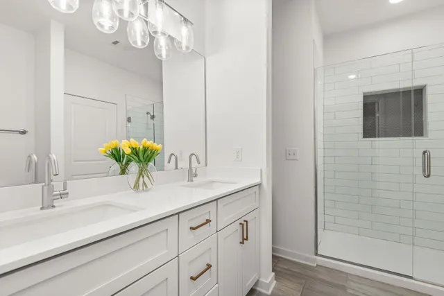 a bathroom with a sink a vanity and a mirror