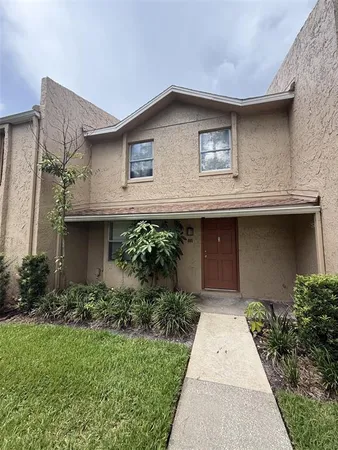 a front view of house with yard