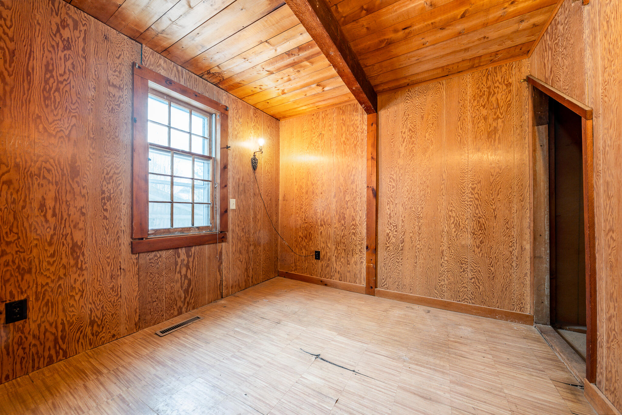 10 N Road West Dennis, MA 02670 - Photo 15 of 31 a view of an empty room with windows and wooden floor