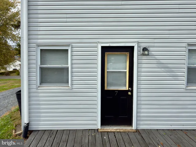 a view of a porch of a house
