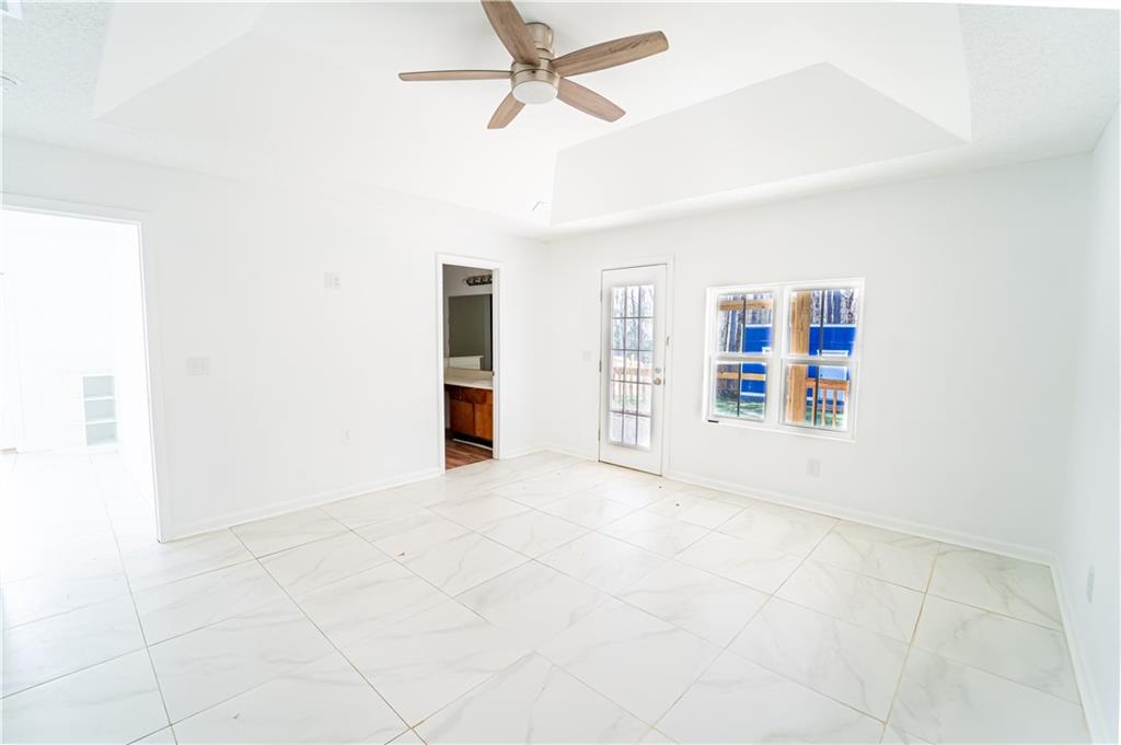 3479 Clare Cottage Trace Southwest Austell, GA 30106 - Photo 13 of 40 an empty room with closet and windows
