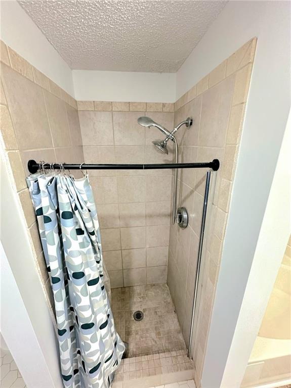 3479 Clare Cottage Trace Southwest Austell, GA 30106 - Photo 18 of 40 a bathroom with a shower