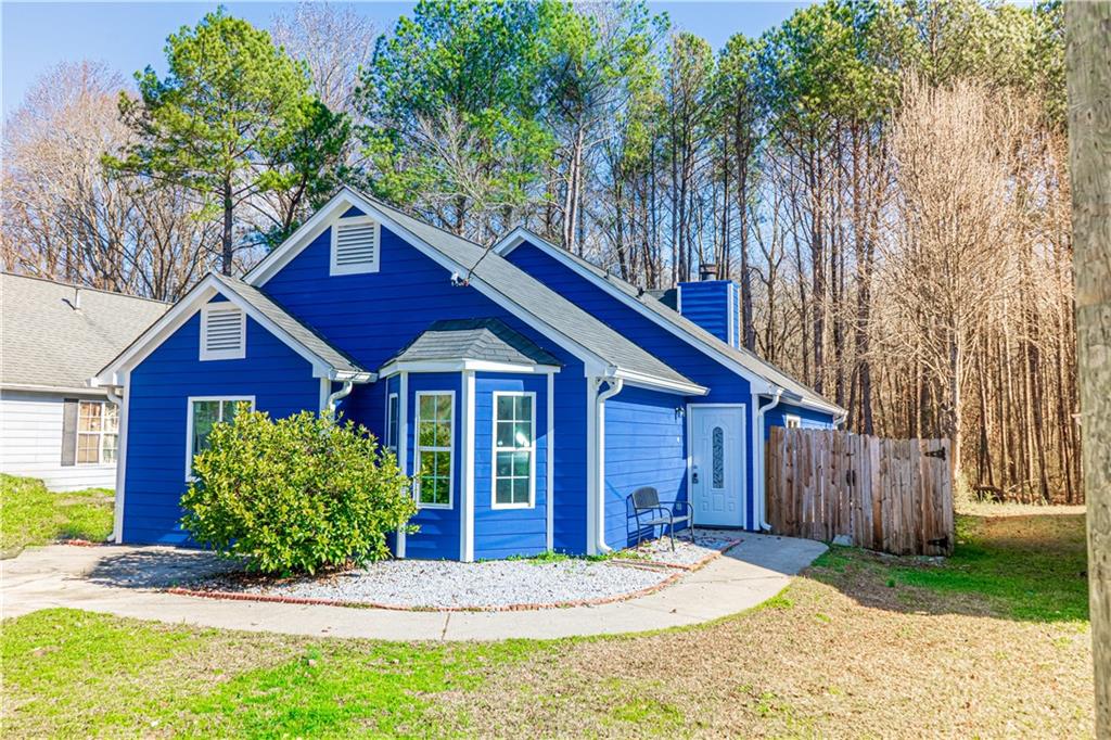 3479 Clare Cottage Trace Southwest Austell, GA 30106 - Photo 2 of 40 a front view of a house with a yard