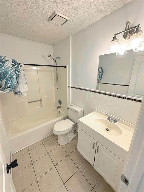 3479 Clare Cottage Trace Southwest Austell, GA 30106 - Photo 28 of 40 a bathroom with a sink a toilet and shower