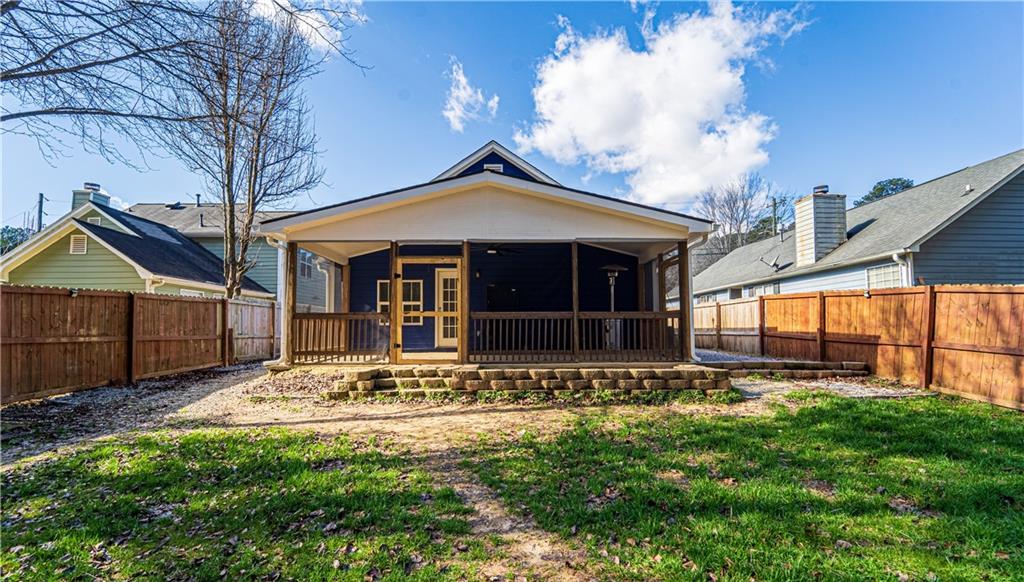 3479 Clare Cottage Trace Southwest Austell, GA 30106 - Photo 32 of 40 a view of a house with a small yard and a large tree