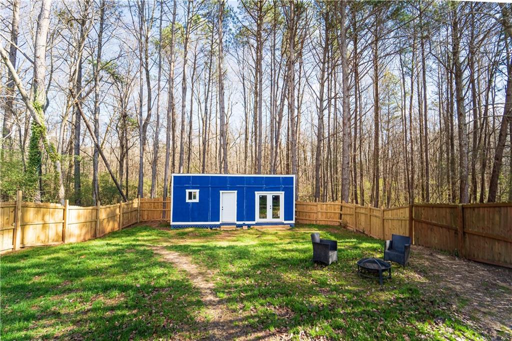 3479 Clare Cottage Trace Southwest Austell, GA 30106 - Photo 33 of 40 a view of a house with backyard and sitting area