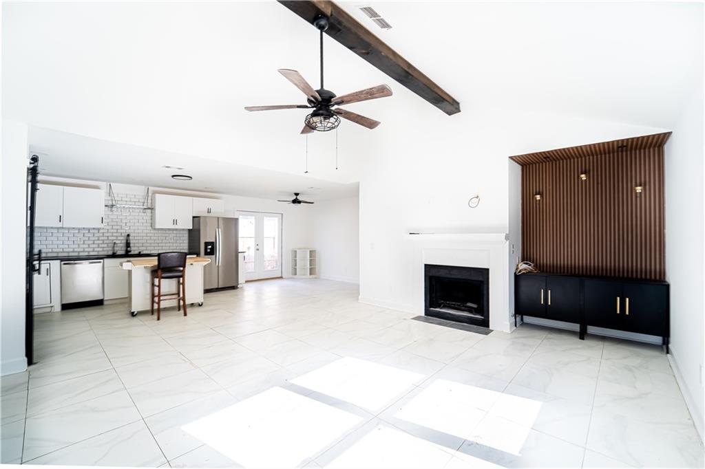 3479 Clare Cottage Trace Southwest Austell, GA 30106 - Photo 4 of 40 a view of a livingroom with furniture and a fireplace