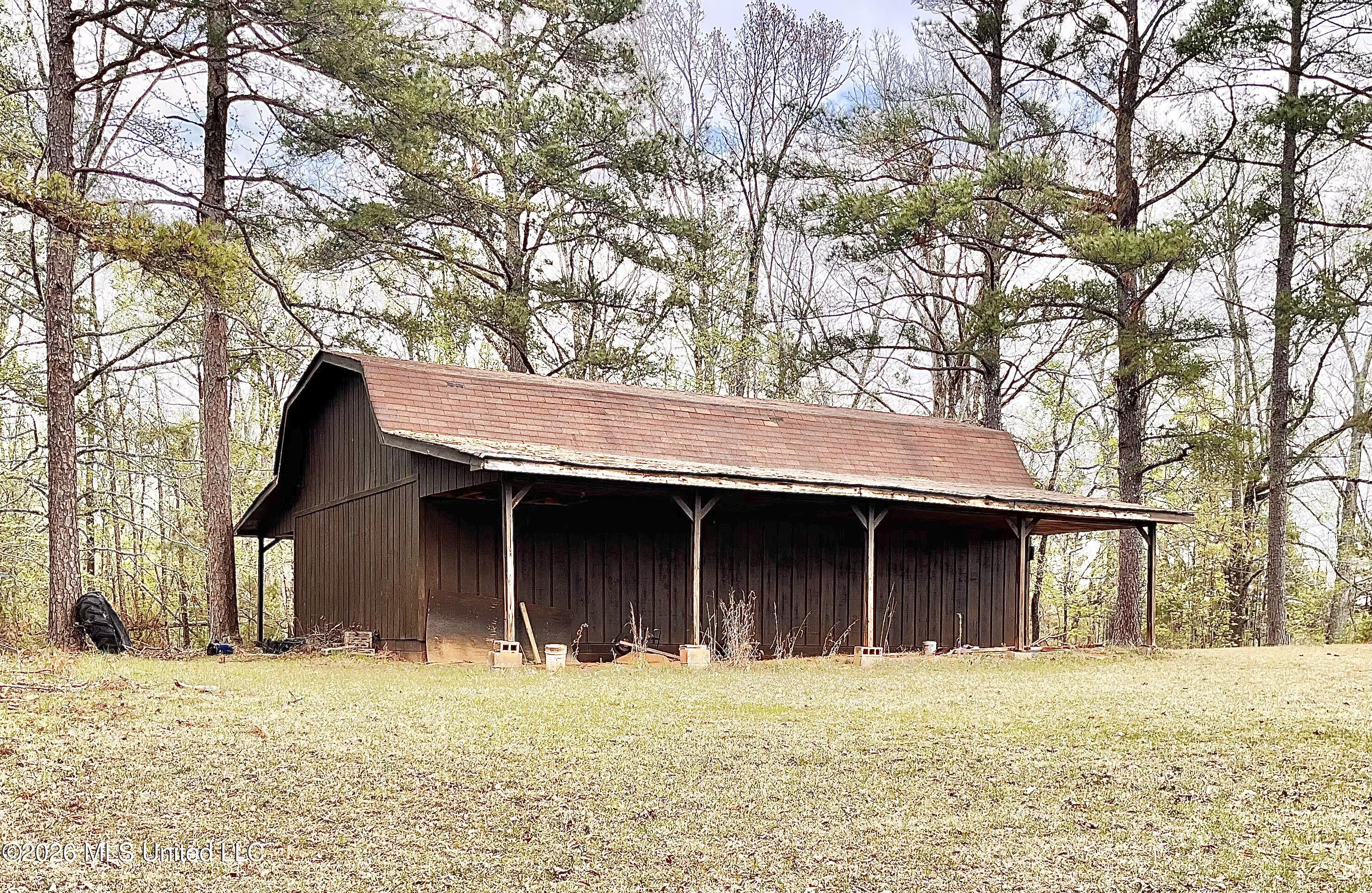 3221 Pine Grove Road Blue Mountain, MS 38610 - Photo 14 of 30 barn south side