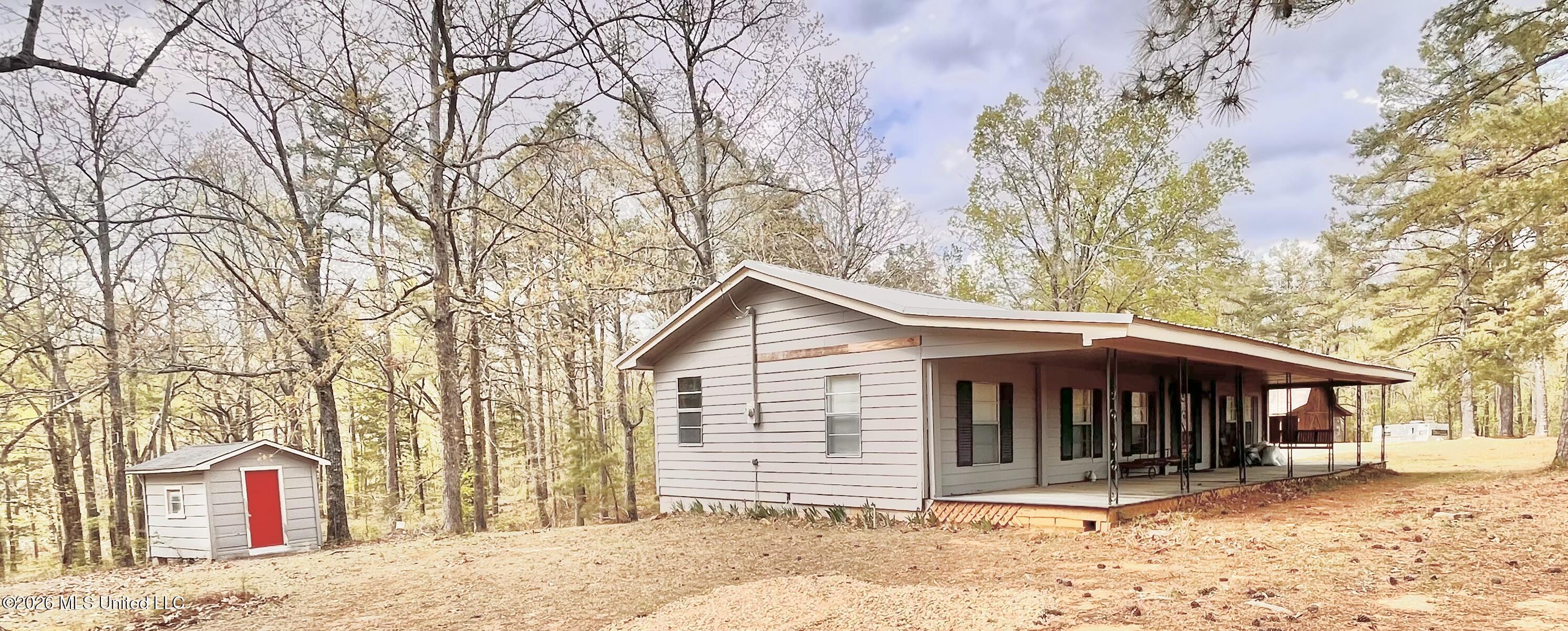 3221 Pine Grove Road Blue Mountain, MS 38610 - Photo 4 of 30 SE side of house