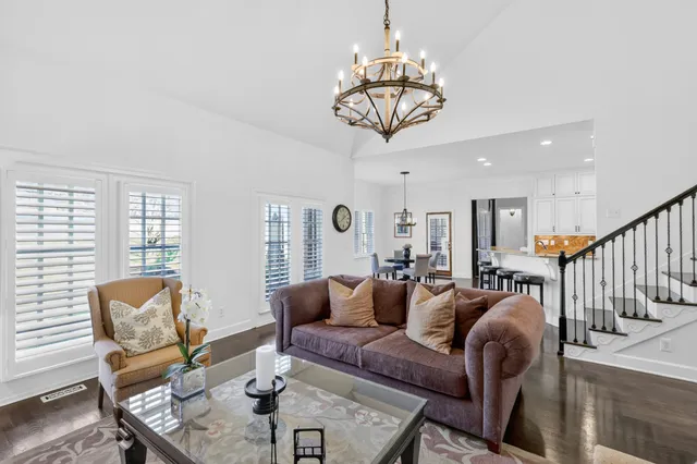 a view of living room with furniture and a window