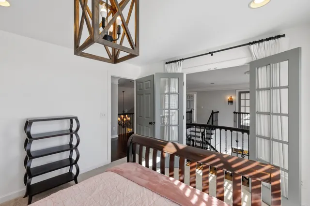 a view of a livingroom with furniture and a window