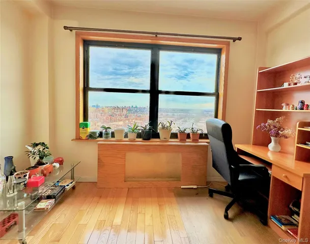 a workspace with furniture and a window