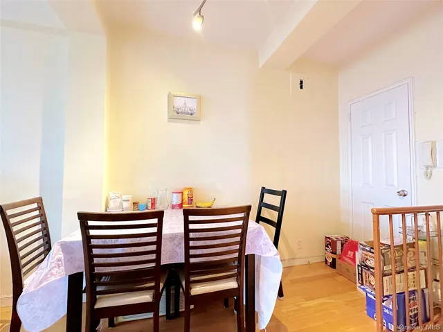 a bedroom with furniture and a book shelf