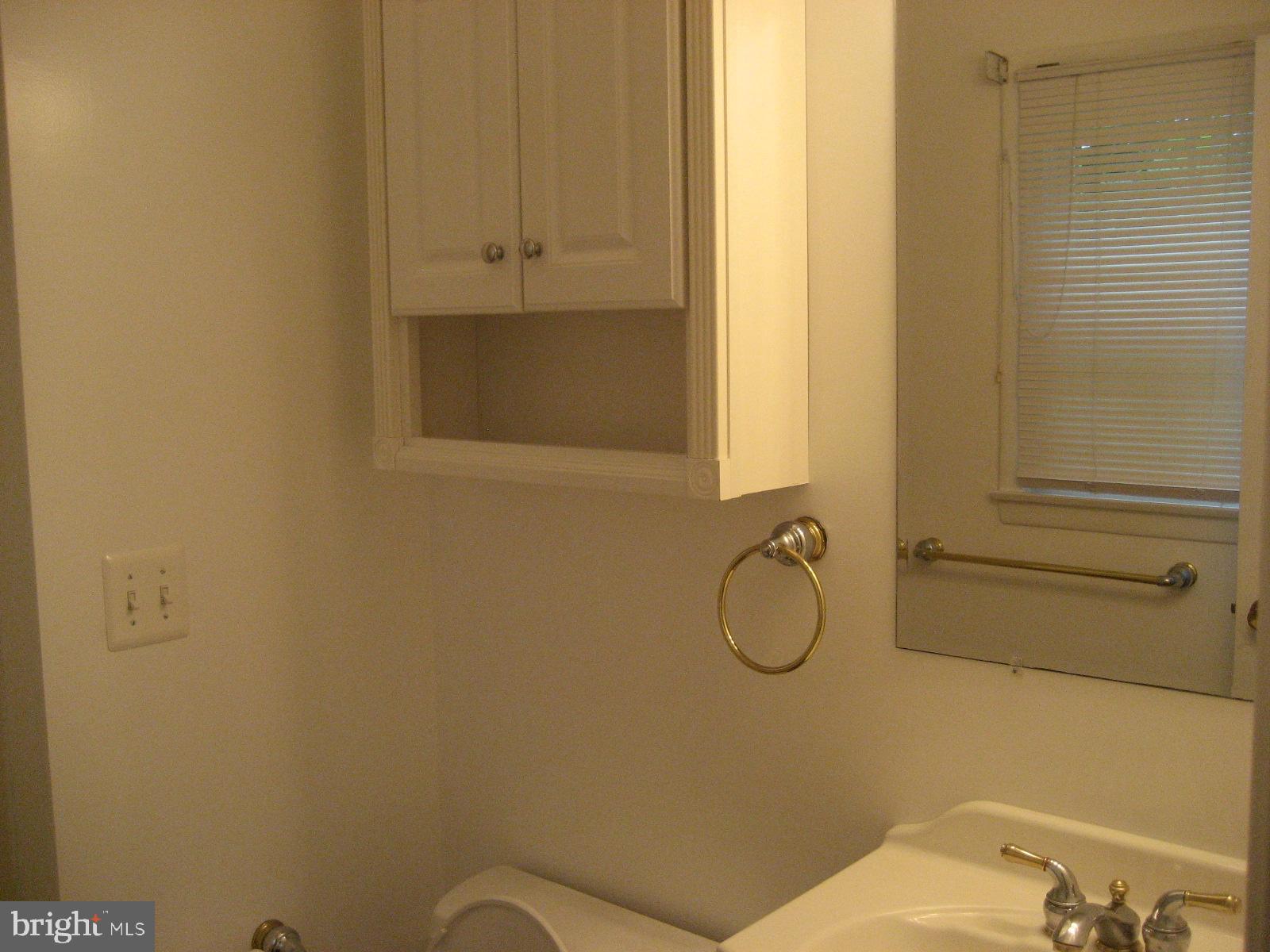 209 Dover Road Warrenton, VA 20186 - Photo 27 of 30 a bathroom with a granite countertop shower