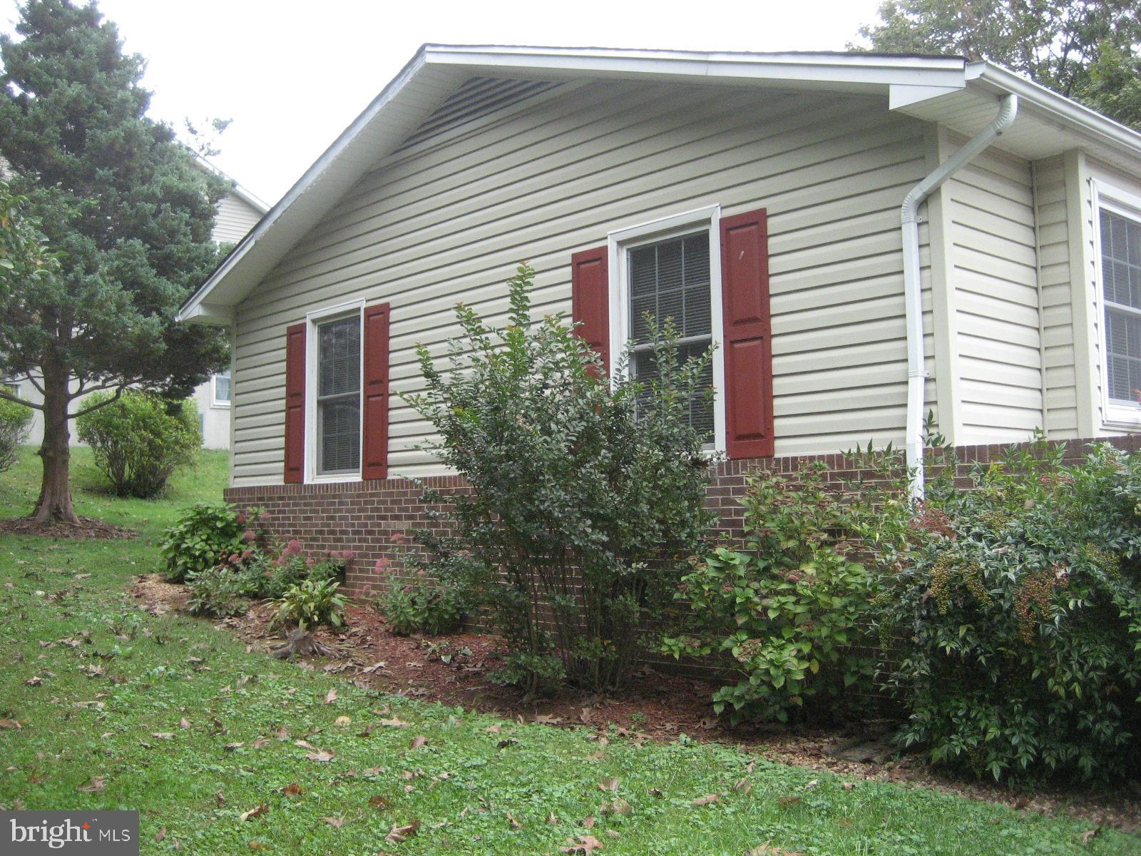 209 Dover Road Warrenton, VA 20186 - Photo 29 of 30 a house that has a lot of plants in it