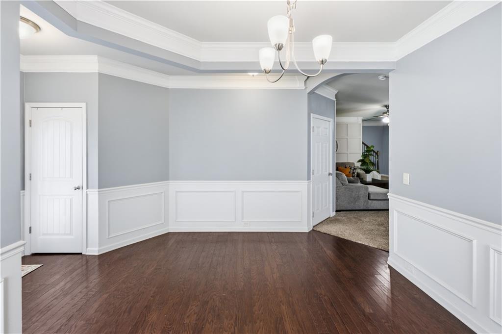 291 Boulder Run Hiram, GA 30141 - Photo 6 of 46 wooden floor in an empty room with a window