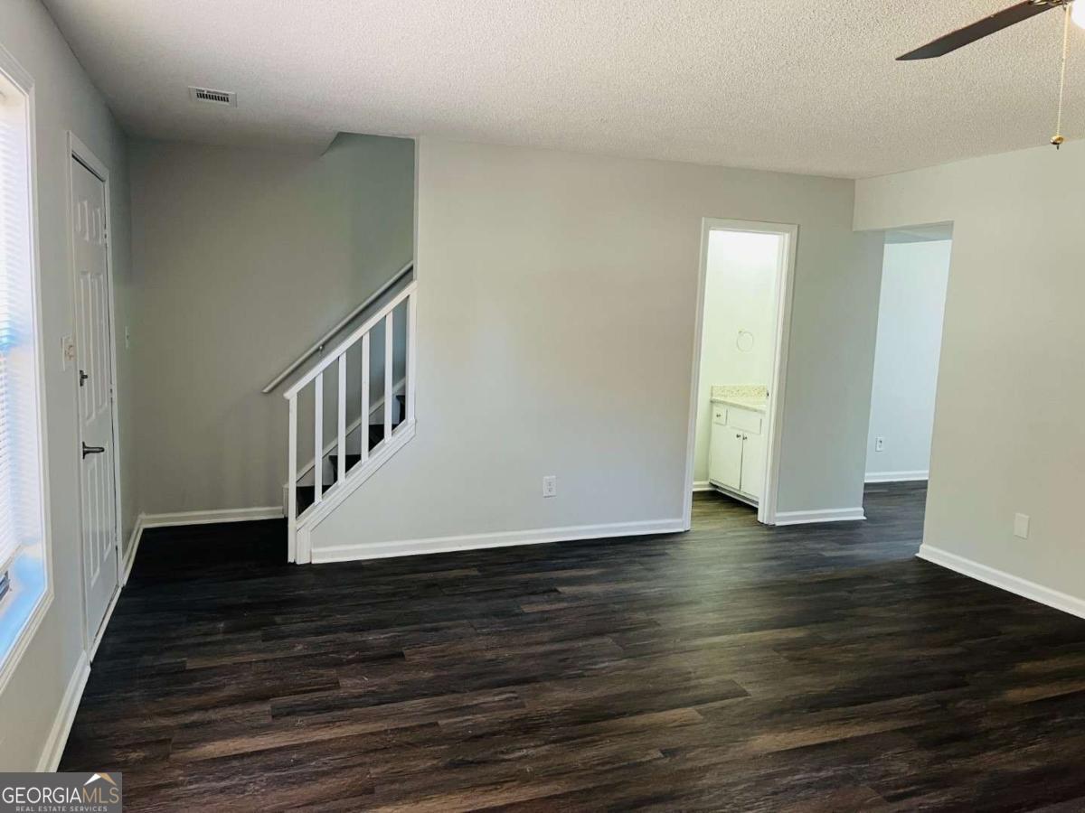5614 Windwood Road, Unit 5614 Atlanta, GA 30349 - Photo 11 of 26 a view of an entryway with wooden floor