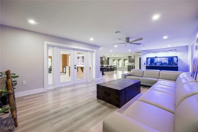 a room with furniture and a flat screen tv