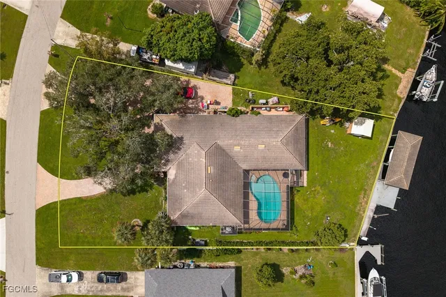 an aerial view of a house with a garden