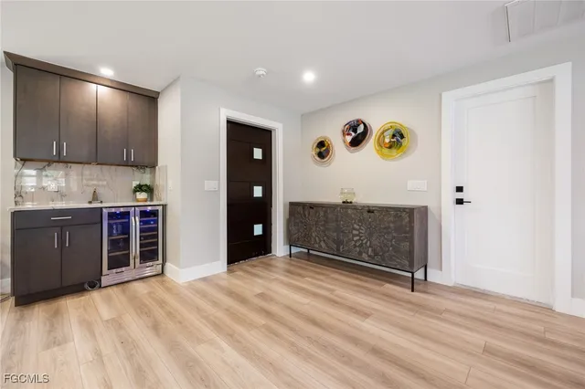 a kitchen with a table and chairs in it