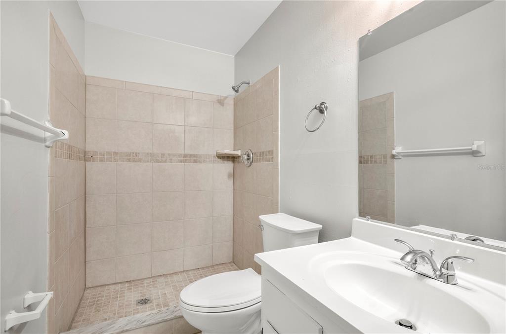 709 Sailfish Road Winter Springs, FL 32708 - Photo 14 of 28 a bathroom with a sink toilet and shower