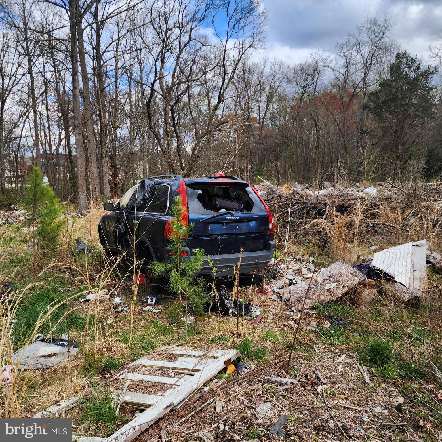 12947 Fletchertown Road Bowie, MD 20720 - Photo 8 of 8 car and trash