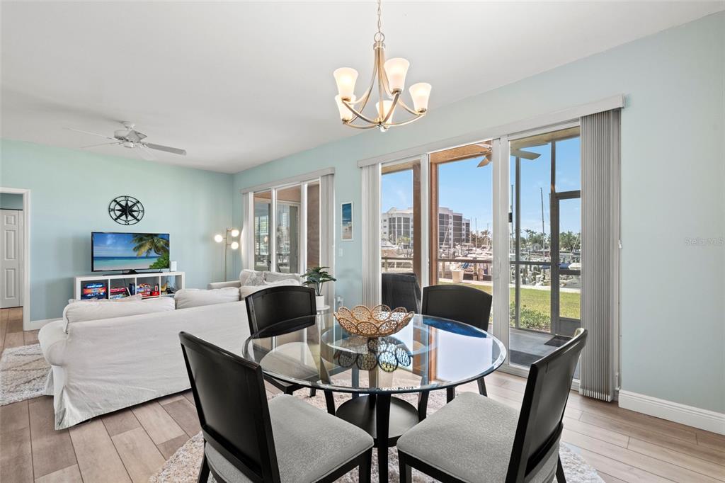 2060 Matecumbe Key Road, Unit 2106 Punta Gorda, FL 33955 - Photo 11 of 56 a dining room with furniture and window