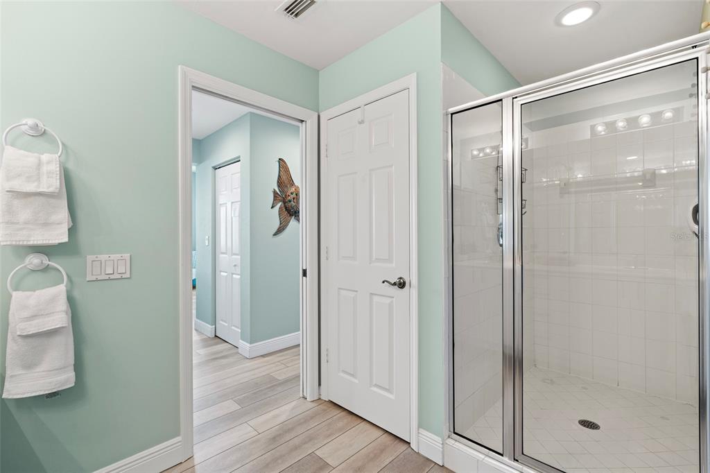 2060 Matecumbe Key Road, Unit 2106 Punta Gorda, FL 33955 - Photo 21 of 56 a bathroom with a glass shower door