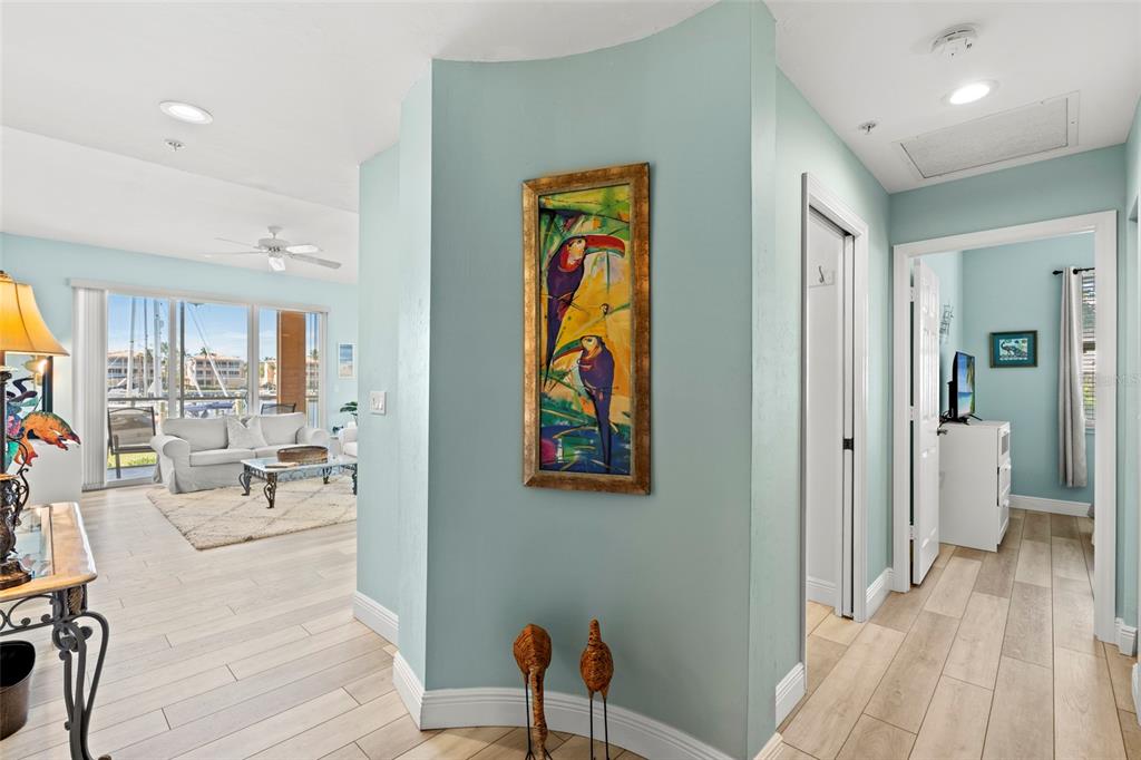 2060 Matecumbe Key Road, Unit 2106 Punta Gorda, FL 33955 - Photo 23 of 56 a view of a hallway with dining area and glass door