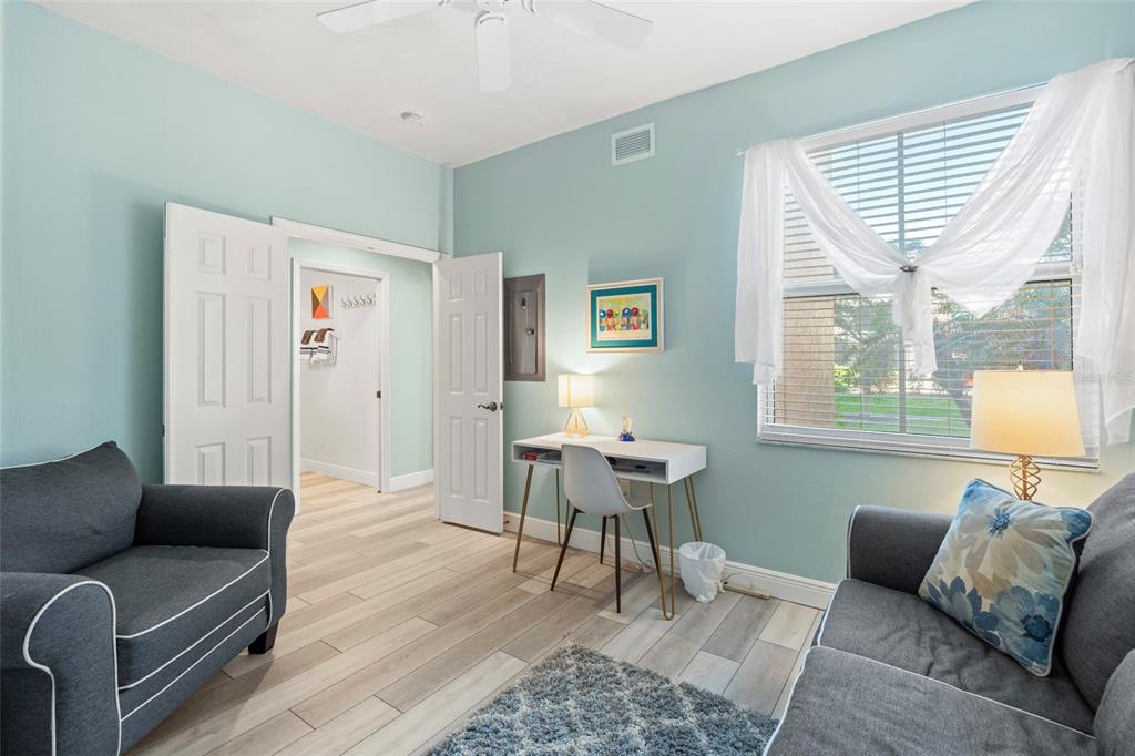 2060 Matecumbe Key Road, Unit 2106 Punta Gorda, FL 33955 - Photo 28 of 56 a living room with furniture and a window