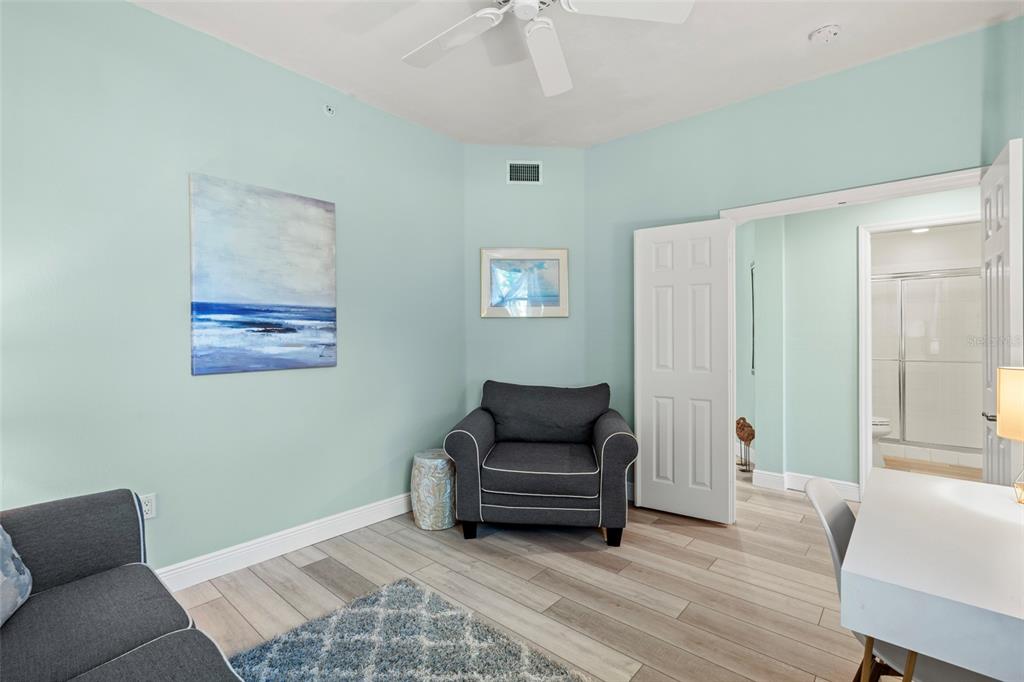 2060 Matecumbe Key Road, Unit 2106 Punta Gorda, FL 33955 - Photo 29 of 56 a living room with furniture and a wooden floor