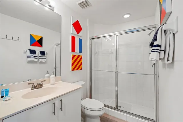 a view of a hallway with washer and dryer