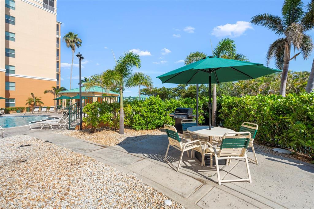 2060 Matecumbe Key Road, Unit 2106 Punta Gorda, FL 33955 - Photo 43 of 56 a view of a backyard with sitting area