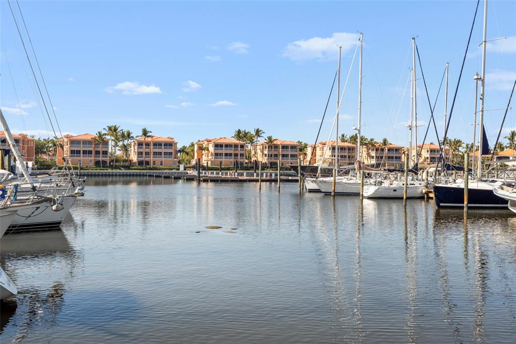 2060 Matecumbe Key Road, Unit 2106 Punta Gorda, FL 33955 - Photo 44 of 56 a view of water with boats and trees in the background