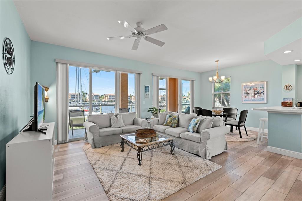 2060 Matecumbe Key Road, Unit 2106 Punta Gorda, FL 33955 - Photo 6 of 56 a living room with furniture large window and wooden floor