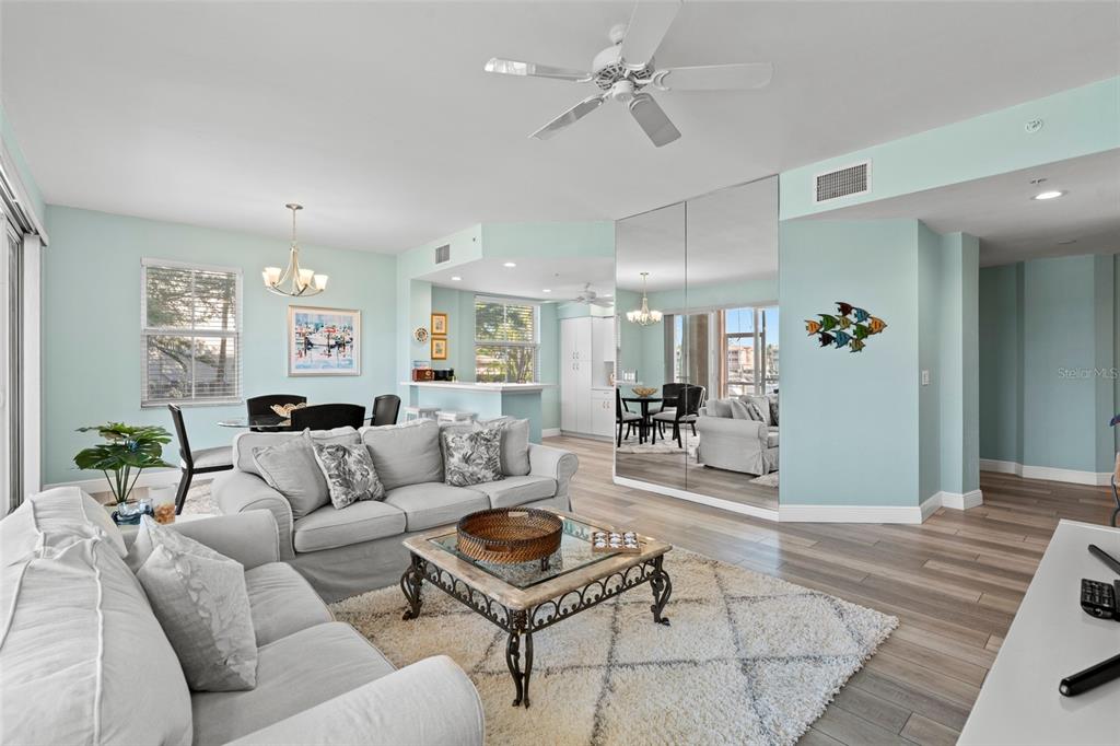 2060 Matecumbe Key Road, Unit 2106 Punta Gorda, FL 33955 - Photo 7 of 56 a living room with furniture and a chandelier