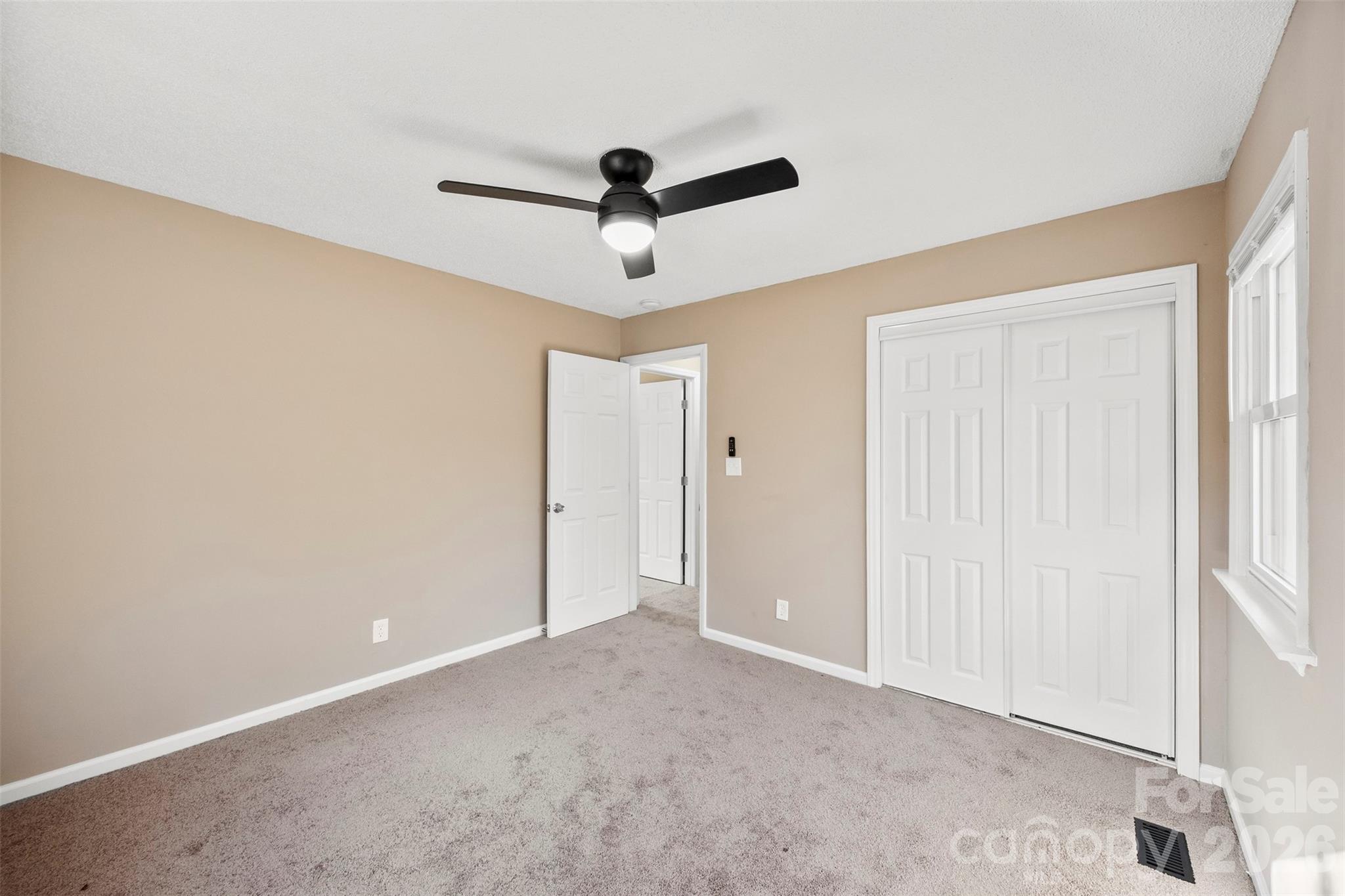 161 Potato House Road Lawndale, NC 28090 - Photo 15 of 33 a view of a livingroom and a ceiling fan