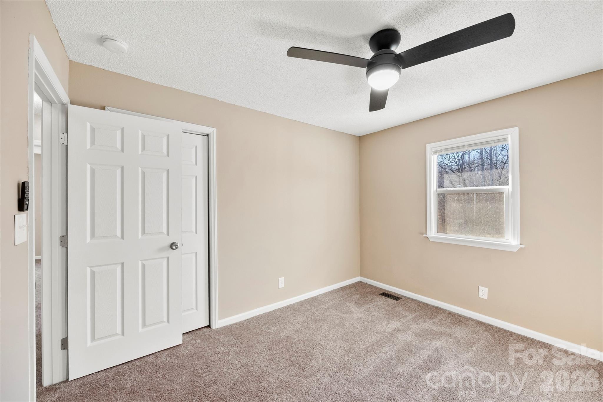 161 Potato House Road Lawndale, NC 28090 - Photo 17 of 33 a view of an empty room and window