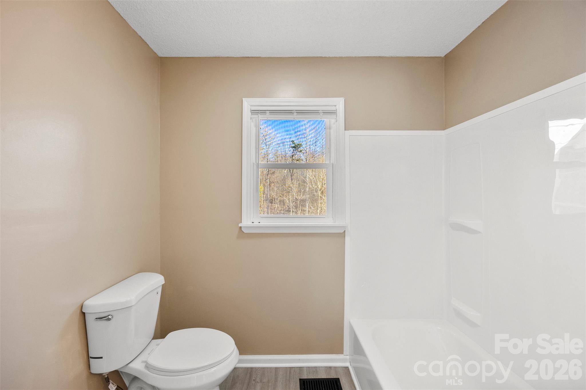 161 Potato House Road Lawndale, NC 28090 - Photo 23 of 33 a white toilet sitting next to a shower