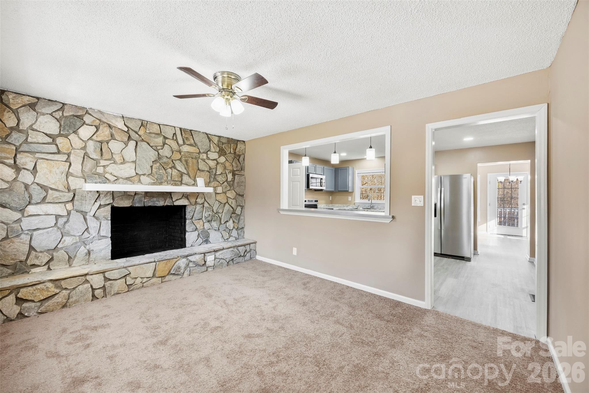 161 Potato House Road Lawndale, NC 28090 - Photo 4 of 33 an empty room with windows and fan