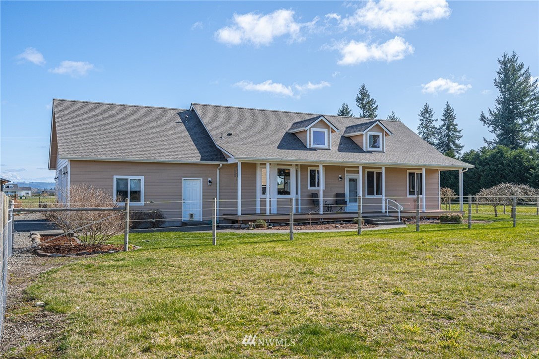16847 Sheldon Lane Southwest Rochester, WA 98579 - Photo 2 of 40 a view of a house with a yard porch and sitting area