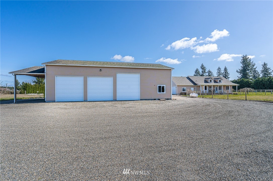 16847 Sheldon Lane Southwest Rochester, WA 98579 - Photo 13 of 40 a view of a house with a yard and sitting area