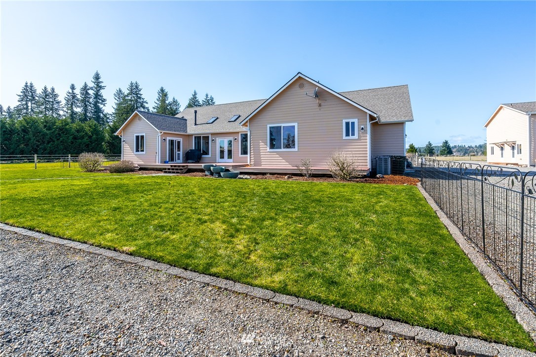 16847 Sheldon Lane Southwest Rochester, WA 98579 - Photo 4 of 40 a front view of a house with yard