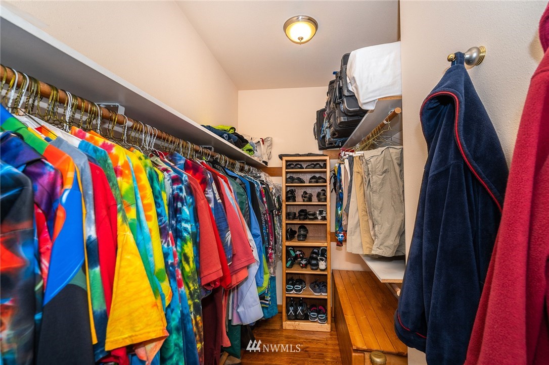 16847 Sheldon Lane Southwest Rochester, WA 98579 - Photo 40 of 40 a view of walk in closet with clothes and shoes