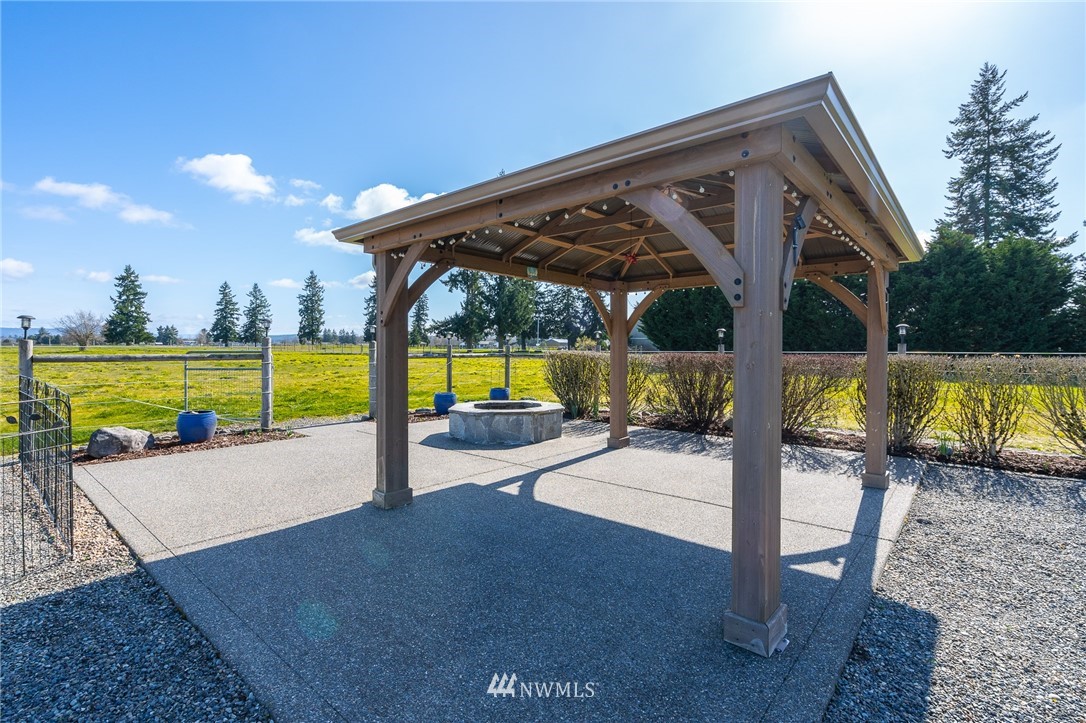 16847 Sheldon Lane Southwest Rochester, WA 98579 - Photo 5 of 40 a view of a swimming pool with a patio and a tub