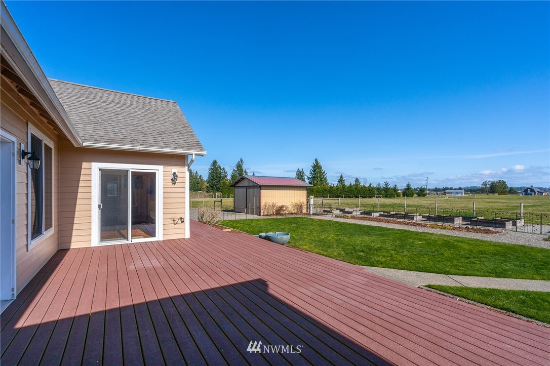 16847 Sheldon Lane Southwest Rochester, WA 98579 - Photo 8 of 40 a view of a house with a yard