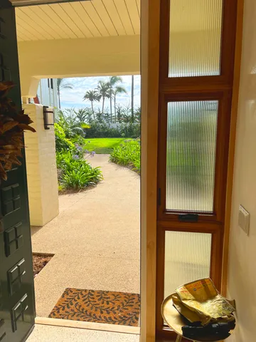 a view of a door and chair